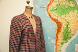 Vintage Armani blazer with reddish-brown, black, beige houndstooth, collarless style.