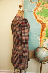 Vintage Armani long blazer, red, black, and tan houndstooth pattern, side view.