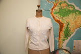 Vintage 50s ivory lambswool angora sweater with white beaded floral designs and pearl buttons.