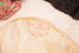 Harilela's brand label on vintage ivory lambswool angora sweater interior.