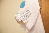 Adrienne Vittadini dress label, size 10, 100% cotton with teal floral pattern.
