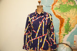 Vintage Christian Dior navy blue blouse with red, white, yellow candy cane stripes.
