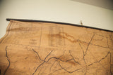 Tan 1930s Orange County map detail with dark water staining and discoloration.