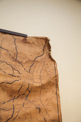 Dolph Stewart New York map's upper corner with water damage, discoloration, and crumpled edge.