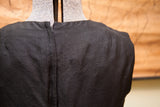 Zipper and seam detail on the textured black silk back of the vintage Mancini dress.