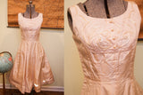 Vintage pink taffeta dress bodice with delicate sequined swirls and pearl buttons.