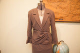 Light brown mercerized wool suit jacket, draped button waist, cream lace detail.