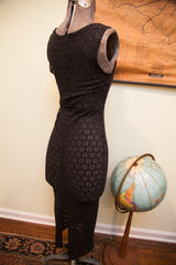 Black Betsey Johnson dress with flower cut-outs and a distinct side slit.