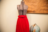 Velvet texture of vintage red maxi skirt with matching belt and buckle.