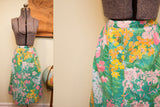 Side buttons on vintage Herman Geist skirt, featuring a vibrant floral pattern.