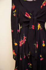 Vintage Betsey Johnson floral dress with knotted tie and vibrant pink yellow print.