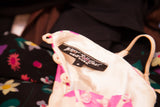 Betsey Johnson New York brand label, size 6, on ivory floral dress.