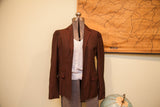 Vintage Alberta Feretti brown pinstripe blazer with bright red stitching.