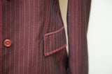 Maroon pinstripe vintage jacket with bright red zigzag stitching on pocket detail.