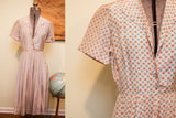 Vintage 1930s rayon day dress bodice with pinkish ivory, brown, light blue geometric pattern, rhinestone buttons.