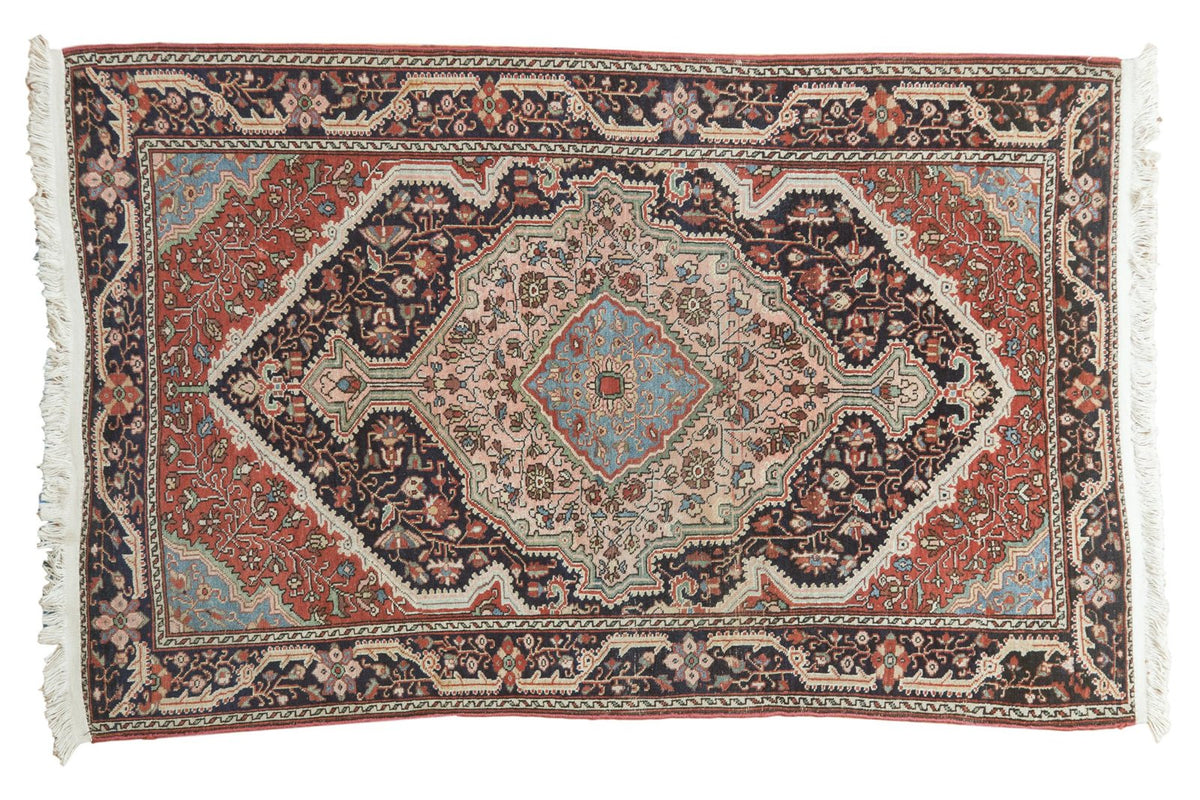 Vintage Persian Josan Sarouk rug, classic medallion, sky blue, rose, terracotta, and deep navy.