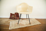 Blanched Turkish rug runner showcasing its pastel medallion and decorative border pattern.
