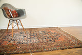 Antique Feraghan rug with worn Herati design in terracotta and deep navy, 4'3