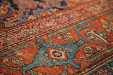 Early 20th century Kurdish rug texture with worn pile and geometric Herati design in blue, red.