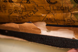Vintage map bottom edge detail showing torn paper, water damage, and Zacatecas region.