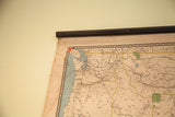Vintage map of Washington and British Columbia, with water staining and wood dowel.