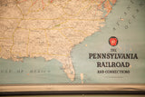 Vintage Pennsylvania Railroad map detail with logo, connections text, and East Coast patina.