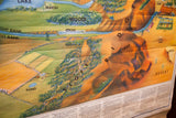 Vintage 1960s map detail of desert, mesa, and crag landforms in warm hues.