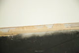 Visible bubbling and peeling on the bottom edge of the vintage Jean Harlow street art.