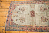 Antique Laver Kerman: whimsical floral motifs on a subtle sea foam blue-grey field.