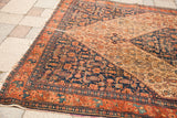 Fine herati pattern and low pile on an antique Persian Senneh rug's purple silk selvage.