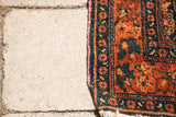 Unusual purple silk selvage and patterned border on an antique Persian Senneh rug.