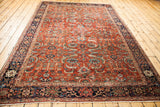 Late 19th-century Fereghan carpet, earth-tone rust field, allover floral motifs, saturated greens and blues.