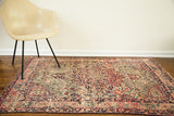 Worn antique Kerman rug featuring blanched tones, allover intricate floral pattern, 3'11