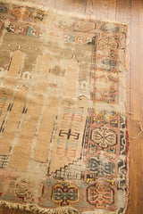 Tattered antique Turkish prayer rug with blanched gold and beige worn pile.