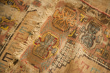 Blanched aesthetic and worn texture of a tattered antique Turkish prayer rug.