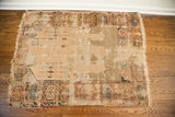 Antique Turkish Prayer Rug, blanched aesthetic with tattered geometric design in light gold and beige.