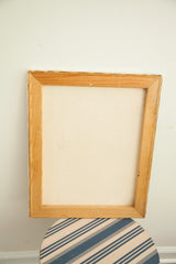 Back of the vintage modern painting, showing the canvas and simple wood frame.