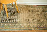 Worn antique Caucasian rug with allover geometric pattern in blues, ivory, and yellow, 3'1