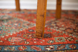 A wooden Thonet chair leg revealing its unique aged patina and wear.