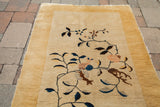 Thick pile rendering of Art Deco floral vines on the antique Chinese Nichols rug.