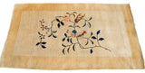 Antique Art Deco floral design in blue, pink, and brown on thick cream pile.