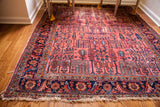 Vintage Lilihan square rug with raspberry red field, blue willow trees, and charming aged wear.
