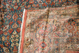 Intricate hand-knotted back and rich teal pile of antique Persian Fereghan rug.