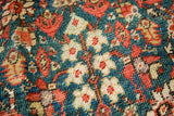 Antique Persian Fereghan Malayer rug's uncommon green field, allover pomegranate design, madder red and cream.