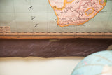 Antique Africa map bottom edge with visible holes, tears, and numbering scale.
