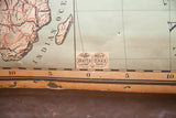 Nystrom BetterMaps label on the antique Africa map, showing tears on the aged bottom.