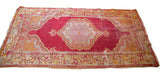 Intricate saffron and silver border with raspberry red field on the vintage Turkish runner.