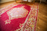 Vintage Turkish runner detail: raspberry red field, intricate saffron yellow and silver border.