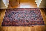 Vintage Malayer Persian runner, rich indigo field with finely detailed coral Herati design.