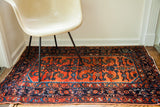 Vintage Persian Engelas rug, deep madder red field, loose herati design, circa 1930s.